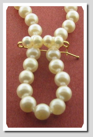 Pearl shortener w/4 white pearls, 14K Yellow Gold