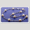 tin-cup pearl necklace